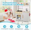 A father and daughter are opening a gift in front of a toy kitchen. Podgląd zdjęcia produktu