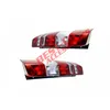 Two car tail lights are shown against a white background. Voir les images du produit