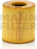 A close-up studio shot of a yellow oil filter. Voir les images du produit