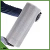 A person wearing gloves holds a roll of mesh fencing. Podgląd zdjęcia produktu