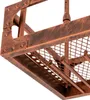 A close-up view of a metal wine rack with a copper-like finish, showing rivets and a mesh shelf. Podgląd zdjęcia produktu