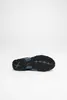 The sole of a shoe is shown against a white background. Produktbild-Vorschau