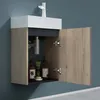 A bathroom vanity with an open cabinet showing toiletries. Produktbild-Vorschau