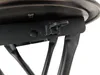 The underside of a black folding stool, showing the connection of the legs to the seat frame and a locking mechanism. Anteprima dell’immagine prodotto