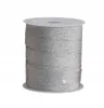 A roll of silver glitter ribbon on a white background. Produktbild-Vorschau