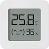 A digital thermometer and hygrometer displaying temperature and humidity readings. Podgląd zdjęcia produktu