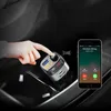 A hand is shown interacting with a car FM transmitter while a smartphone displays an incoming call. Podgląd zdjęcia produktu