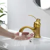 A person washing their hands under a retro-style faucet in a sink. Náhled obrázku produktu