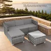 A grey rattan lounge set with cushions and a coffee table is placed on a tiled patio overlooking the sea and trees. Náhled obrázku produktu