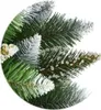 A close-up view of artificial Christmas tree branches with a frosted effect. Náhľad obrázku produktu