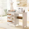 A sewing table with a sewing machine and various sewing supplies. Produktbild-Vorschau