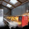 Chicks in a coop with a heater. Produktbild-Vorschau