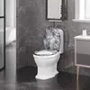 A modern bathroom with a toilet featuring a decorative lid and seat. Produktbild-Vorschau
