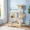 A cat tree with multiple levels and features, set in a room with a window and curtains. Náhled obrázku produktu
