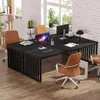 A modern office space with a large black desk, computers, and chairs. Produktbild-Vorschau