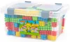 A clear, well-lit studio shot of a clear plastic storage box filled with colorful building blocks. Voir les images du produit