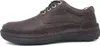 A side view of a brown leather shoe against a white background. Anteprima dell’immagine prodotto