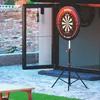 A dartboard on a stand in an outdoor entertainment area. Produktbild-Vorschau