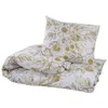 A folded duvet and a pillow with a floral pattern. Produktbild-Vorschau