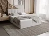 A bedroom scene featuring a light gray upholstered bed with storage. Náhled obrázku produktu