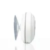 A side view of a white Bluetooth shower speaker with a suction cup attached. Voir les images du produit