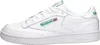A side view of a white Reebok Club 85 sneaker with green accents. Voir les images du produit