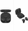 Two views of a pair of black wireless earbuds and their white charging case, presented on a white background. Podgląd zdjęcia produktu