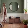 An entryway with a coat rack, a storage bench, and a mirror. Náhľad obrázku produktu