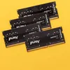 Several computer RAM modules are arranged diagonally on a yellow background. Anteprima dell’immagine prodotto