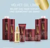 A collection of Londa Professional Velvet Oil hair care products displayed against a light blue background with marketing text at the top. Anteprima dell’immagine prodotto