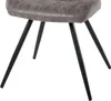 A close-up view of the legs and seat of a chair. Produktbild-Vorschau