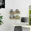 A home office setup with shelves, a computer, and plants. Produktbild-Vorschau