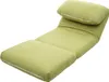 A green chaise lounge chair with a headrest, shown from a diagonal angle against a white background. Produktbild-Vorschau