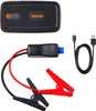 A car battery jump starter kit with its accessories laid out on a white background. Náhled obrázku produktu