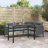 An outdoor dining set on a wooden deck with a wooden fence in the background. Produktbild-Vorschau