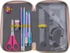 An open pencil case with stationery items inside. Náhled obrázku produktu