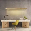 A modern office or dining space with a desk, chair, and pendant light. Náhled obrázku produktu