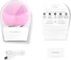 The image shows a pink FOREO LUNA mini 2 facial cleansing device in its packaging, along with a USB charging cable and a small instruction booklet. Produktbild-Vorschau