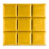 A grid of yellow upholstered wall panels. Anteprima dell’immagine prodotto
