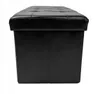 A black upholstered storage ottoman is shown from the front. Podgląd zdjęcia produktu