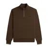 A brown half-zip pullover with a small black logo on the chest. Produktbild-Vorschau