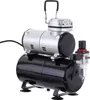 A studio shot of an airbrush compressor with a storage tank. Podgląd zdjęcia produktu