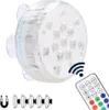 A submersible LED light with a remote control and suction cups. Produktbild-Vorschau