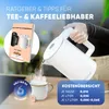 A person is pouring hot water from a white electric kettle into a mug. There is a booklet about tea and coffee tips, a tea bag, and a cost overview displayed. Produktbild-Vorschau