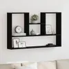 A black wooden wall shelf mounted on a white wall, displaying various decorative items. Náhľad obrázku produktu