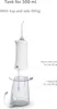 An illustration showing how to fill a water flosser tank. Produktbild-Vorschau