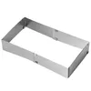 A rectangular baking ring made of stainless steel, shown from a diagonal angle against a white background. Anteprima dell’immagine prodotto