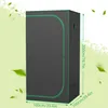 A grow tent with dimensions indicated by text overlays, set against a light green background with floating leaves. Náhled obrázku produktu