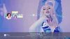 A screenshot from a video game, likely a karaoke game, showing a female singer and lyrics on screen. Náhľad obrázku produktu
