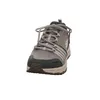A front view of a single gray Skechers sneaker against a white background. Voir les images du produit